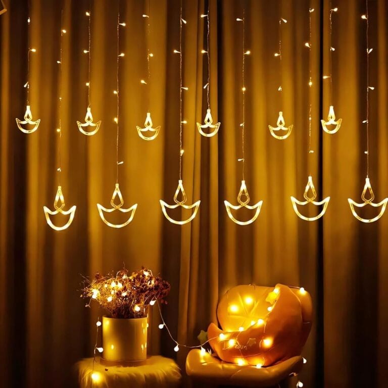 71oMSgWjDwL._SL1500_.jpg One94Store 12 Diya LED Curtain String Lights?